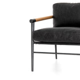 This Rowen Chair - Sonoma Black has buttery black seating of top-grain leather, with angular arms of exposed oak providing fresh contrast. A comfy, modern chair to add to any living room, bedroom, or other area.   Overall Dimensions: 27.50"w x 32.00"d x 31.00"h