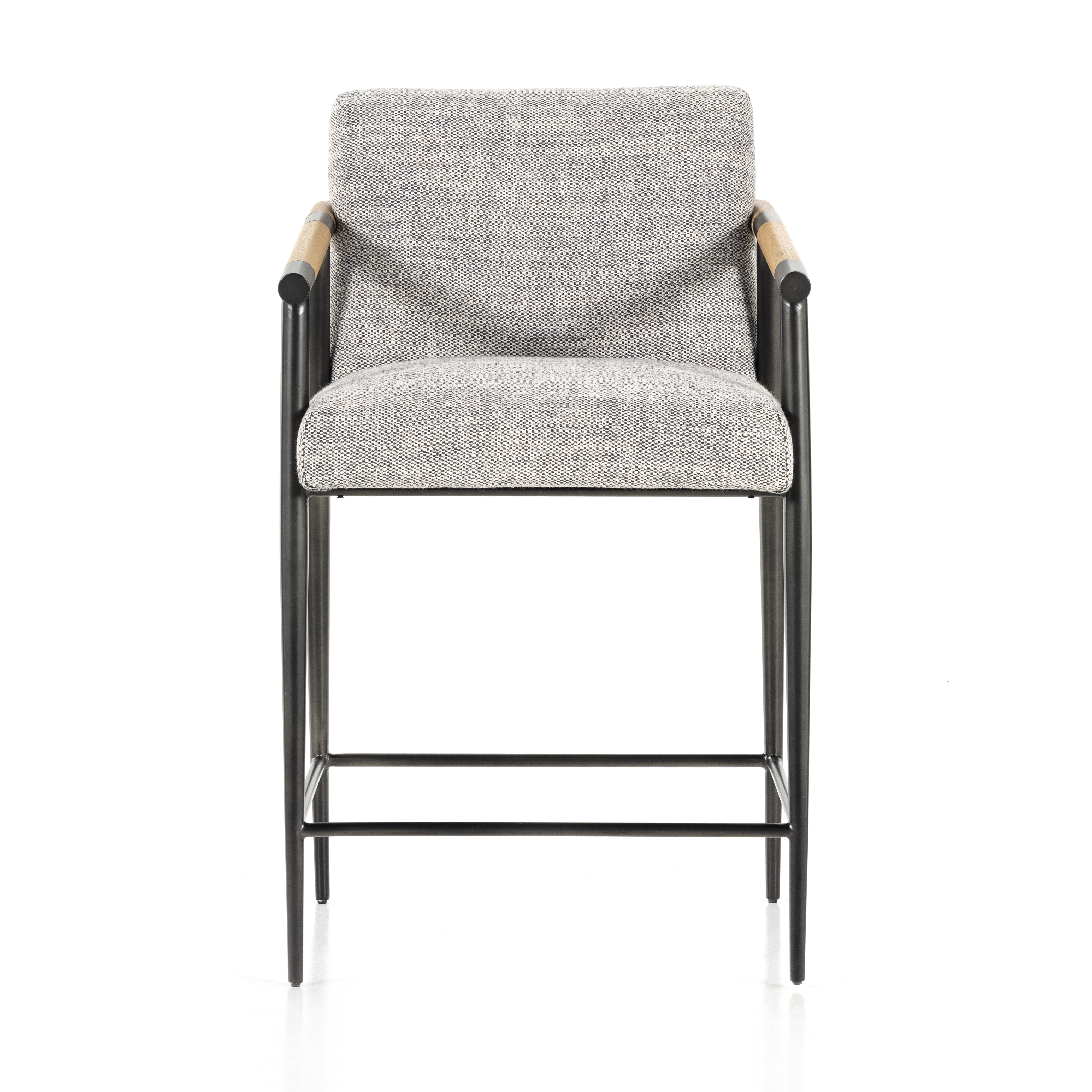 We love the textural grey seating upholstered in a high-performance fabric on this Rowen Bar + Counter Stool - Thames Raven. The angular solid oak arms and black-finished stainless steel framing is perfectly sized to elevate your bar or counter space. 