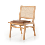 Mixed materials make this Sage Dining Chair - Sierra Butterscotch. Solid, sand-colored beech wood features a natural cane back for extra texture, while a butterscotch-finished leather seat serves total comfort for any dining or kitchen area.   Overall Dimensions: 20.50"w x 24.50"d x 33.75"h