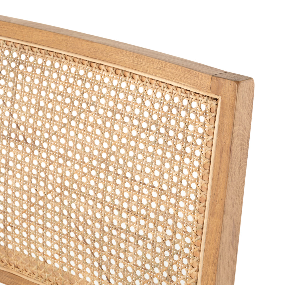 Featuring Sage Dining Chair - Sierra Butterscotch by Four Hands at Amethyst Home. Mixed materials make this Sage Dining Chair - Sierra Butterscotch. Solid, sand-colored beech wood features a natural cane back for extra texture, while a butterscotch-finished leather seat serves total comfort for any dining or kitchen area. 
Overall Dimensions: 20.50"W x 24.  Amethyst Home provides interior design, new home construction design consulting, vintage area rugs, and lighting in the Alpharetta metro area.