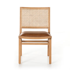 Featuring Sage Dining Chair - Sierra Butterscotch by Four Hands at Amethyst Home. Mixed materials make this Sage Dining Chair - Sierra Butterscotch. Solid, sand-colored beech wood features a natural cane back for extra texture, while a butterscotch-finished leather seat serves total comfort for any dining or kitchen area. 
Overall Dimensions: 20.50"W x 24..  Amethyst Home provides interior design, new home construction design consulting, vintage area rugs, and lighting in the San Diego metro area.