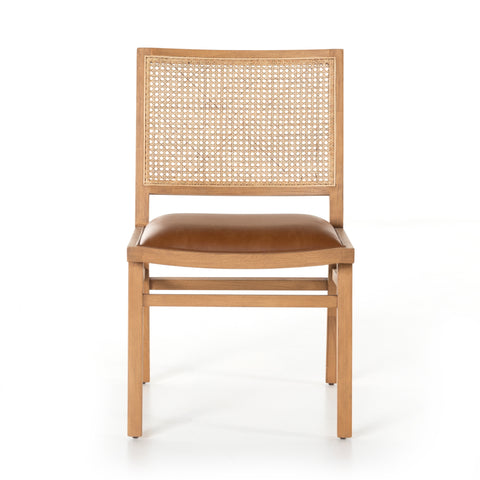 Featuring Sage Dining Chair - Sierra Butterscotch by Four Hands at Amethyst Home. Mixed materials make this Sage Dining Chair - Sierra Butterscotch. Solid, sand-colored beech wood features a natural cane back for extra texture, while a butterscotch-finished leather seat serves total comfort for any dining or kitchen area. 
Overall Dimensions: 20.50"W x 24..  Amethyst Home provides interior design, new home construction design consulting, vintage area rugs, and lighting in the San Diego metro area.