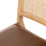 Mixed materials make this Sage Dining Chair - Sierra Butterscotch. Solid, sand-colored beech wood features a natural cane back for extra texture, while a butterscotch-finished leather seat serves total comfort for any dining or kitchen area.   Overall Dimensions: 20.50"w x 24.50"d x 33.75"h