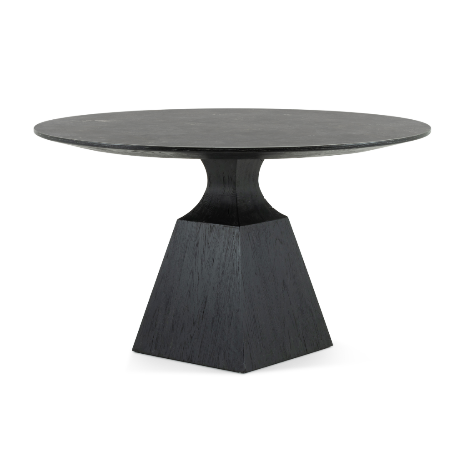 We love the unique bell shape of this Sargon Bluestone Dining Table. It brings an industrial feel to any dining room.   Size: 53.25"w x 53.25"d x 30"h  Colors: Washed Black, Bluestone Materials: Solid Oak, Bluestone