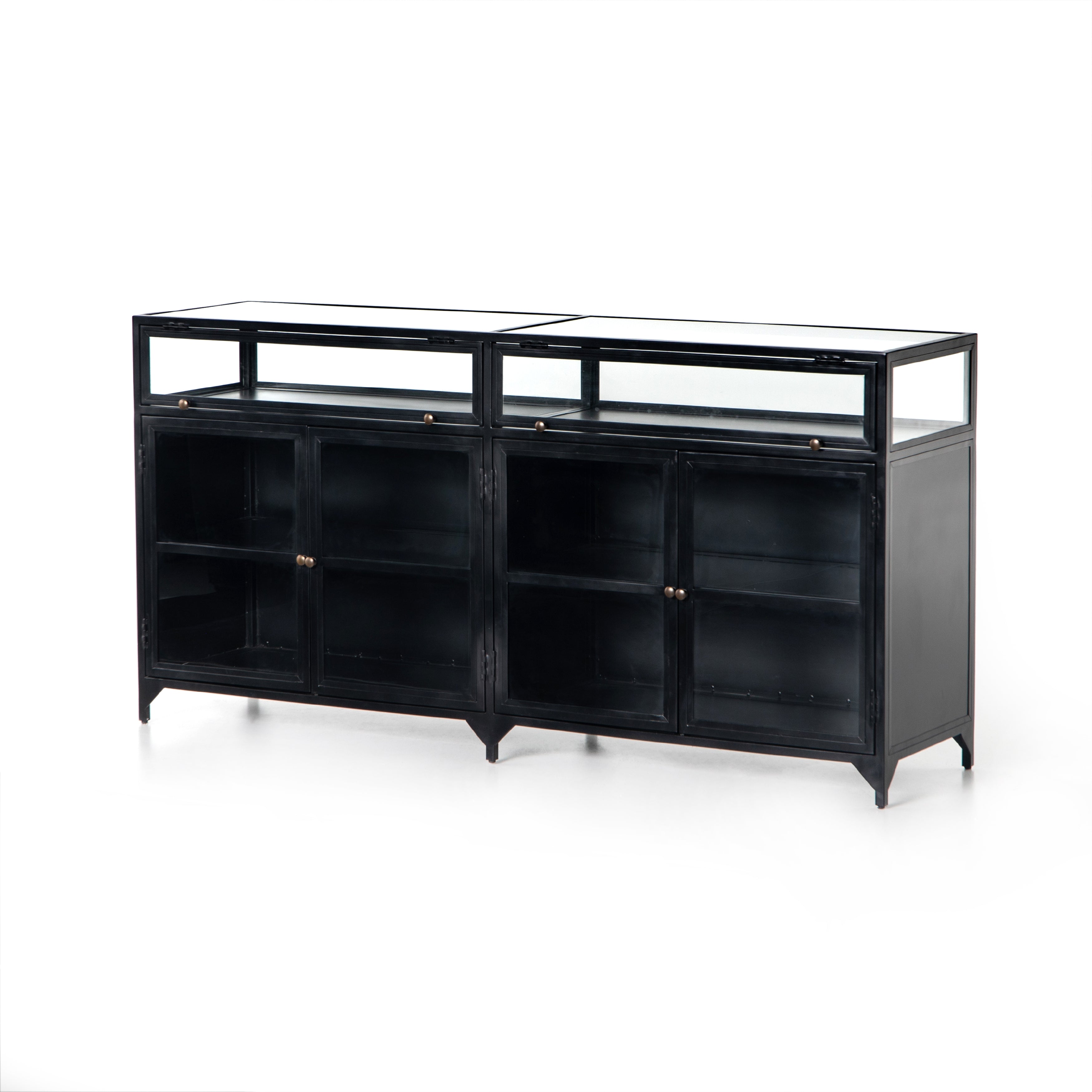 This Shadow Box Sideboard gives your inner collector a place to play. Store prized possessions behind clear glass fronts, with black-finished metal casing and brass hardware for contrast.  Overall Dimensions: 70.00"w x 17.25"d x 35.00"h