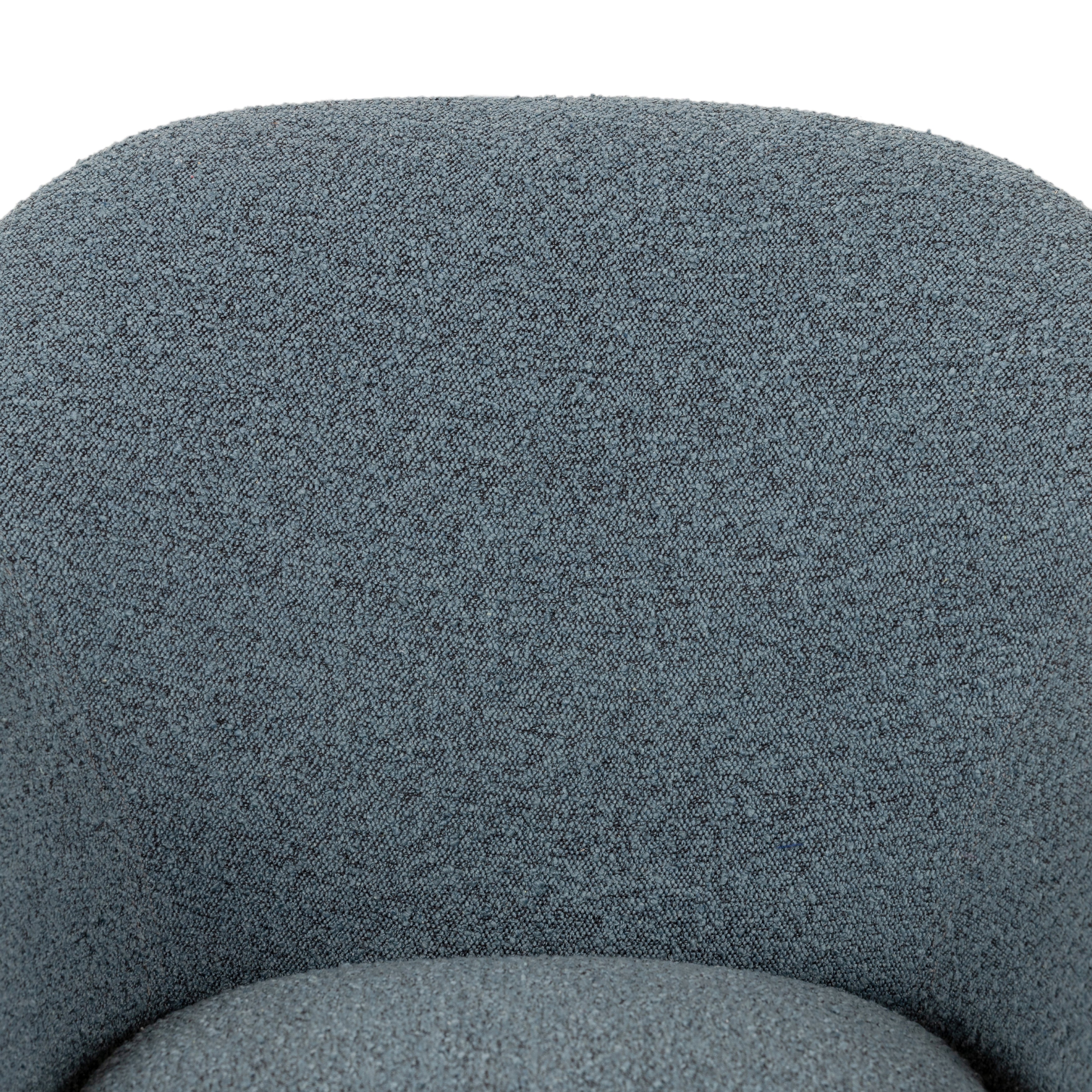 We love the curvy silhouette and classic rolled arms of this Suerte Chair - Knoll Sky. Sky-blue boucle lends a fresh feel to vintage-inspired accent seating for any living room, office, or other area.   Overall Dimensions: 35.00"w x 33.50"d x 31.00"h