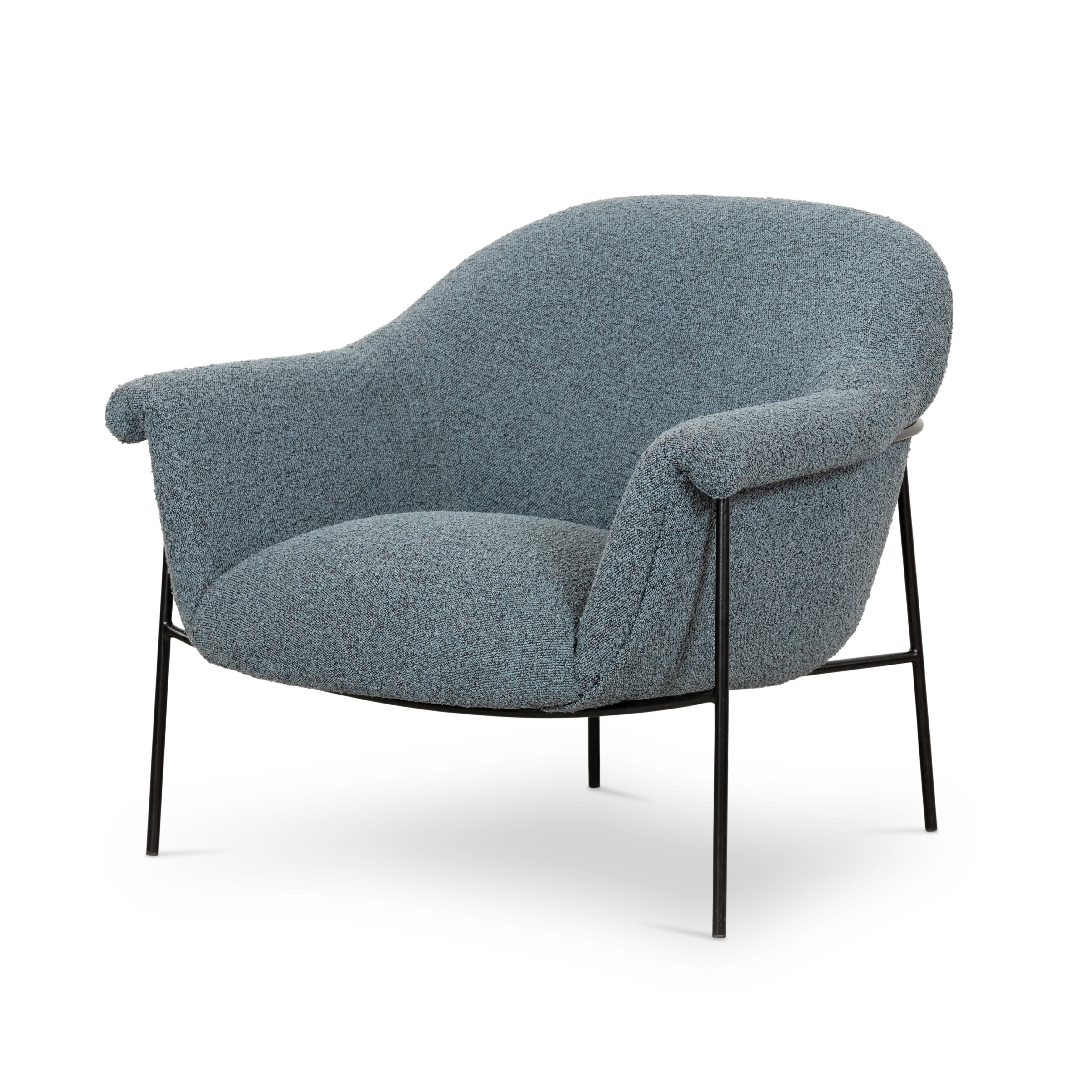 We love the curvy silhouette and classic rolled arms of this Suerte Chair - Knoll Sky. Sky-blue boucle lends a fresh feel to vintage-inspired accent seating for any living room, office, or other area.   Overall Dimensions: 35.00"w x 33.50"d x 31.00"h