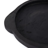 This Tadeo Round Tray - Black is made from reclaimed wood and has a gorgeous organic, earthy feel. Whether it's placed on your coffee table or in your kitchen, this will be your new favorite tray!  Amethyst Home celebrates natural materials, which often comes with beautiful imperfections. Each piece is made uniquely for you, please expect some variation and character. We embrace the design approach of Wabi Sabi!  Overall Dimensions: 23.50"w x 19.75"d x 1.75"h Colors: Black Materials: Solid Reclaimed Wood