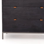 The toffee leather handles of this Trey 5 Drawer Dresser - Black Wash Poplar bring a classy pop of color and texture to the space. A stylish dresser of black-washed poplar offers plenty of bedroom storage space thanks to five spacious drawers.   Overall Dimensions: 36.00"w x 18.00"d x 49.00"h