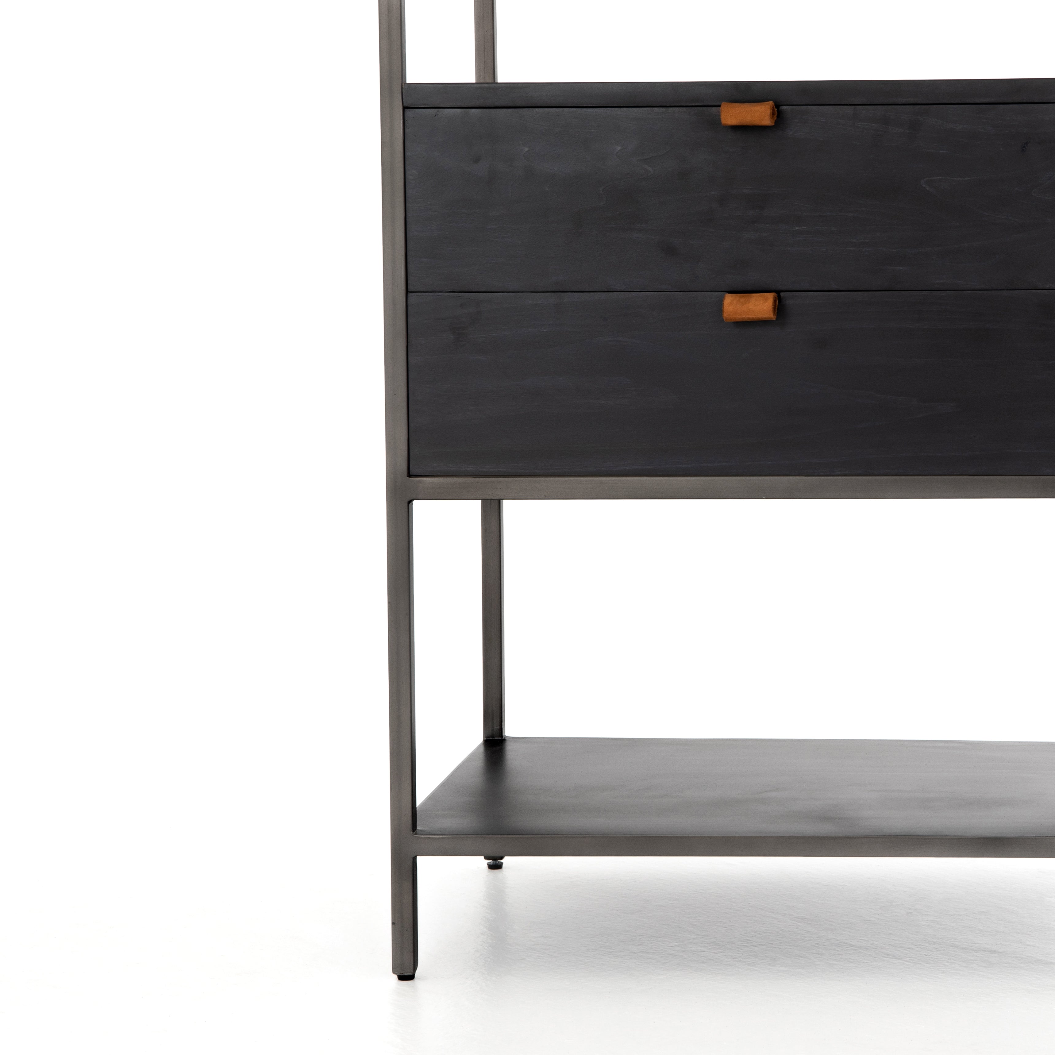 This stylish Trey Bookshelf - Black Wash Poplar offers ample storage space by way of open shelving and dual drawers. Metal-secured pulls of toffee top-grain leather add a textural element of surprise to any office, bedroom, or other space.   Overall Dimensions: 24.00"w x 18.00"d x 78.25"h
