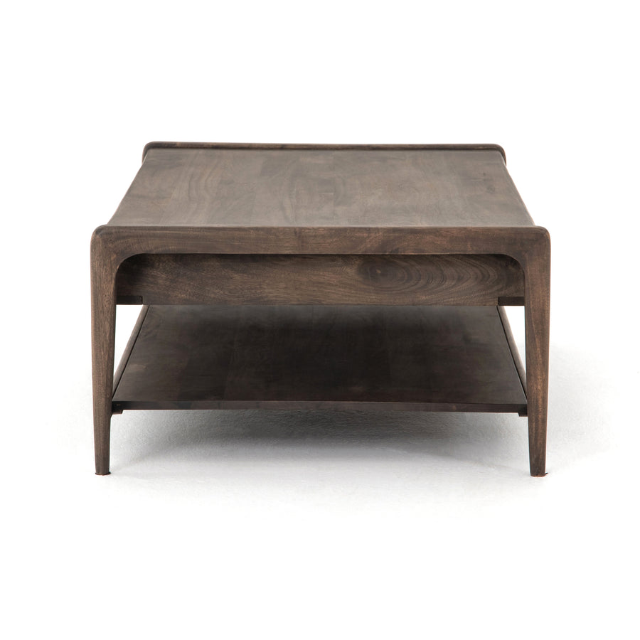 We love the organic element this Valeria Coffee Table brings to space. With four drawers and a bottom shelf, this is both function and beautiful for any living room or lounge area.   Overall Dimensions: 55.00"w x 30.00"d x 16.50"h