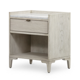 We love the white marble top of this Viggo Nightstand - Vintage White Oak. Made from oak veneer and finished with a dry hand, this brings a farmhouse, vintage feel to any bedroom!  Overall Dimensions: 24.50"w x 17.00"d x 27.00"h