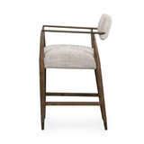 Slim, sculptural style with this Waldon Bar + Counter Stool. Angular framing features a mix of bronze-finished metal and solid rubberwood, for a forward-thinking feel. Textural linen-blend seating adopts an invitingly neutral grey hue to move freely between spaces and styles.