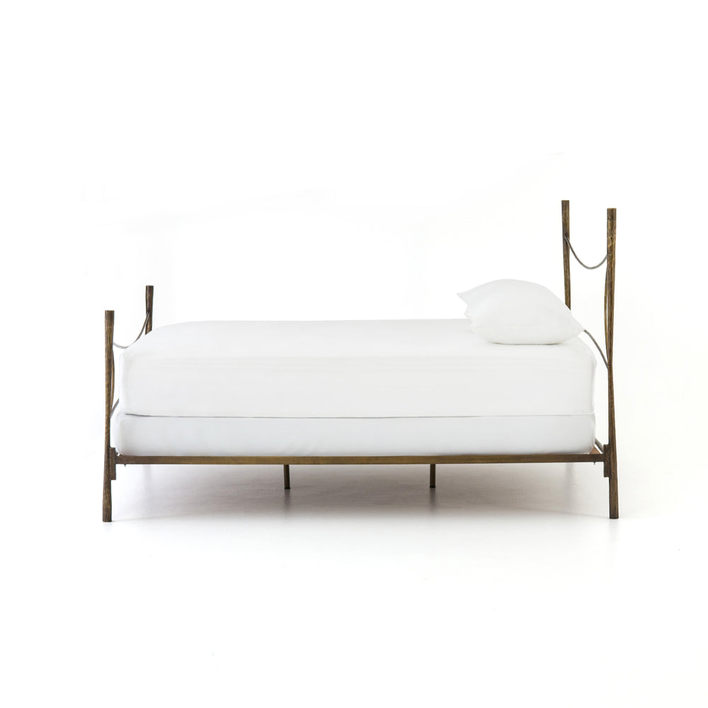 Featuring Westwood Bed by Four Hands at Amethyst Home. Beguiling curves soften hard materials for marked drama with this Westwood Bed. Slim, hammered iron is finished in antique brass for depth that defies this frame's feminine air. Low-profile box spring recommended.
Colors: Antique BrassMaterials: Iron
Queen Overall Dimensions:  62.00"w x 84.00"d x 51.0.  Amethyst Home provides interior design, new home construction design consulting, vintage area rugs, and lighting in the Des Moines metro area.