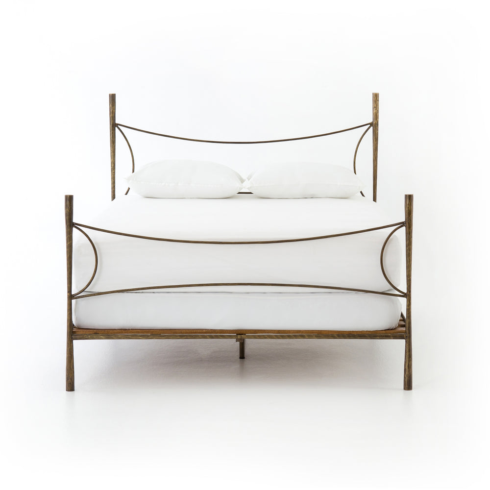 Featuring Westwood Bed by Four Hands at Amethyst Home. Beguiling curves soften hard materials for marked drama with this Westwood Bed. Slim, hammered iron is finished in antique brass for depth that defies this frame's feminine air. Low-profile box spring recommended.
Colors: Antique BrassMaterials: Iron
Queen Overall Dimensions:  62.00"w x 84.00"d x 51.00.  Amethyst Home provides interior design, new home construction design consulting, vintage area rugs, and lighting in the Park City metro area.