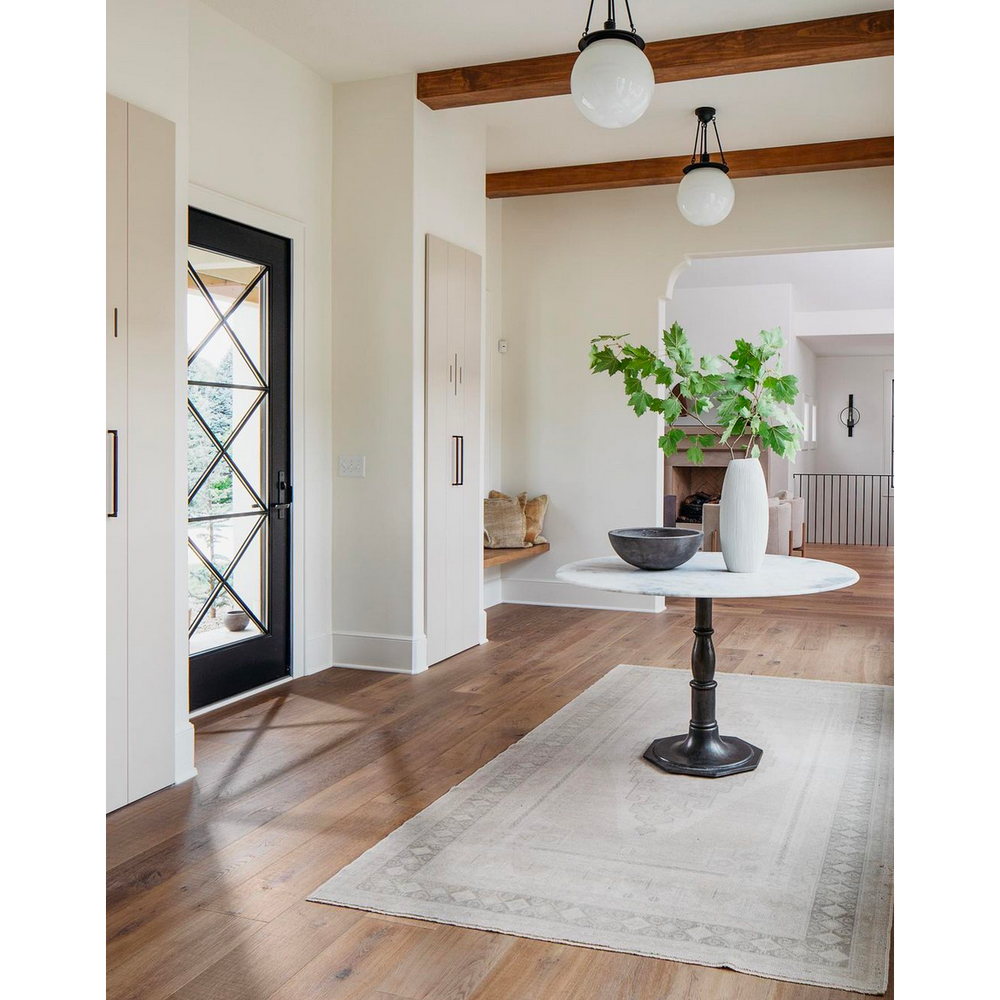 Featuring Lucy Carbon Wash Round Dining Table by Four Hands at Amethyst Home. The Lucy Carbon Wash Round Dining Table beautifully captures the French industrial meets dining table vibe. Beautifully detailed, 8-sided cast iron pedestal supports a dramatic white marble top with a bull-nosed edge.
Size: 48"w x 48"d x 30"hWeight: 227.17 lbs
Size: 60"w x 60"d x 30.  Amethyst Home provides interior design, new home construction design consulting, vintage area rugs, and lighting in the Dallas metro area.