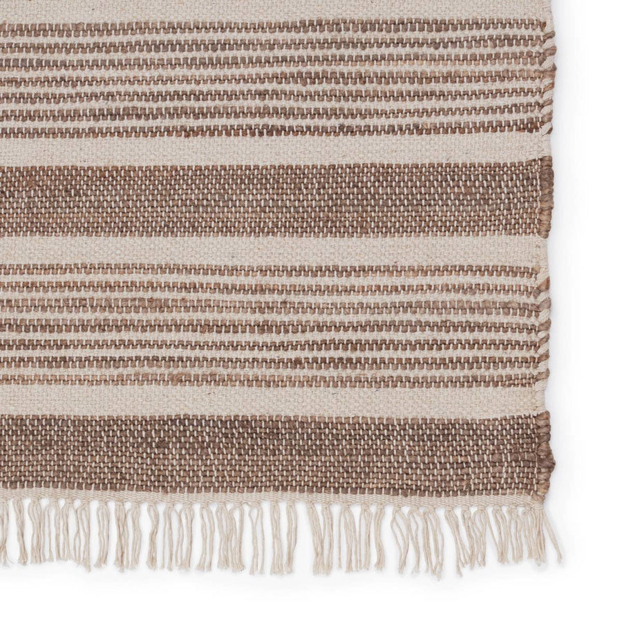 The Jaipur Living Adobe Kahlo Portabella Rug, or ADO01 boasts a casual, warm style with effortless modernity. The handwoven Kahlo rug is crafted of jute and cotton for a finely woven and relaxed foundation underfoot. The neutral gray and cream colorway offers versatility to any space.