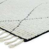 Inspired by textiles from the Tullu region in Morocco, the Alpine brings texture and versatility to both global and modern spaces. Crafted of natural wool, the hand-knotted Ammil rug features a plush, ridged feel and an asymmetrical trellis design in cream and black tones.  Hand-Knotted 100% Wool ALP03 Alpine Ammil Rug