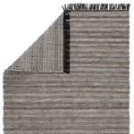 The Jaipur Living Castillo Torre Area Rug - Jet Black, or CSL03, features a soft feel and relaxed, versatile style. The Torre area rug showcases a blend of light gray and cream tones for a grounding, neutral look. Crafted of PET yarn or recycled plastic, this durable is perfect for indoor and outdoor spaces. 