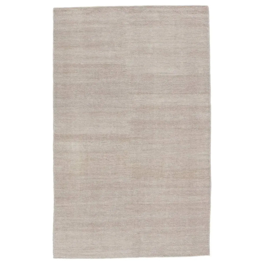 The eco-friendly Rebecca Feather Gray Area Rug by Jaipur Living delivers a fresh accent to patios, kitchens, and dining rooms with its ultra-durable PET yarn handwoven construction. The light taupe colorway grounds any room or area with a fresh, neutral style.
