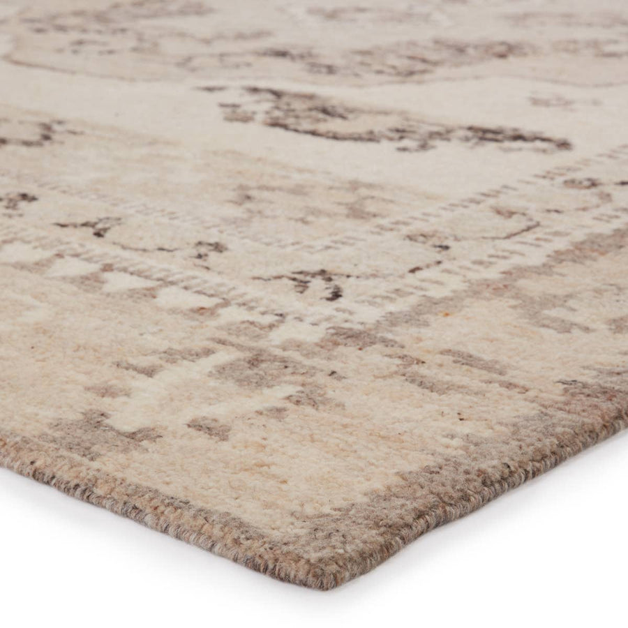 The inviting and traditionally inspired Repose collection marries stunning artisan craftsmanship and the beauty of natural, undyed wool. The Sherpa-like, hand-knotted construction of the Solna area rug boasts a plush texture underfoot and is perfect for adding warmth and coziness to a space. The neutral gray, brown, beige, and ivory tones ground the Kars-style motif with effortless versatility.  Hand Knotted 100% Wool RPS01