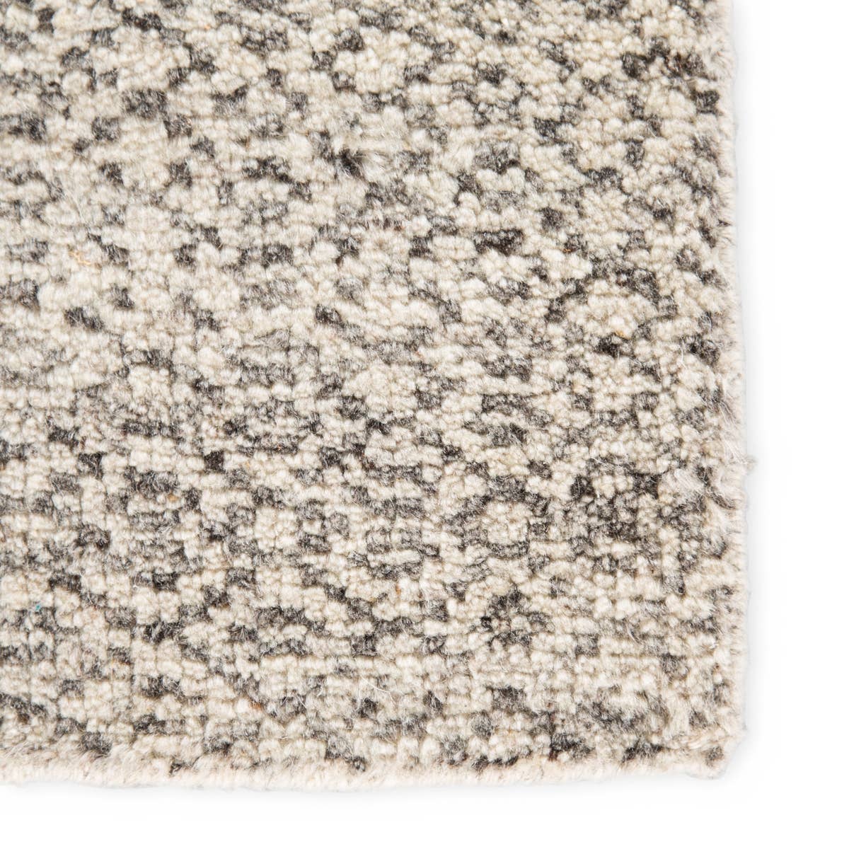 The Rize Neema Area Rugs offers intricate and delicately designed global patterns to the modern home. Small-scale geometric motifs create a captivating banded design on the artistically distressed Neema area rug. In a light neutral colorway of white and gray, this durable hand-knotted wool accent blends a timeless craft with contemporary charm.  Hand Knotted 100% Wool RIZ02