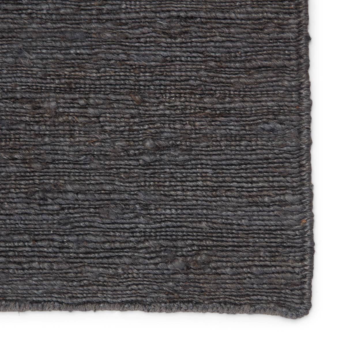 The Sabine collection lends rich texture and organic allure to modern homes. The Linden rug features a fine, single-line Sumak knotting technique for an exquisite feel and craftsmanship. This rich, black natural rug is the perfect accent for sophisticated spaces in want of a grounding layer. Natural  80% Jute I 20% Cotton SAB02
