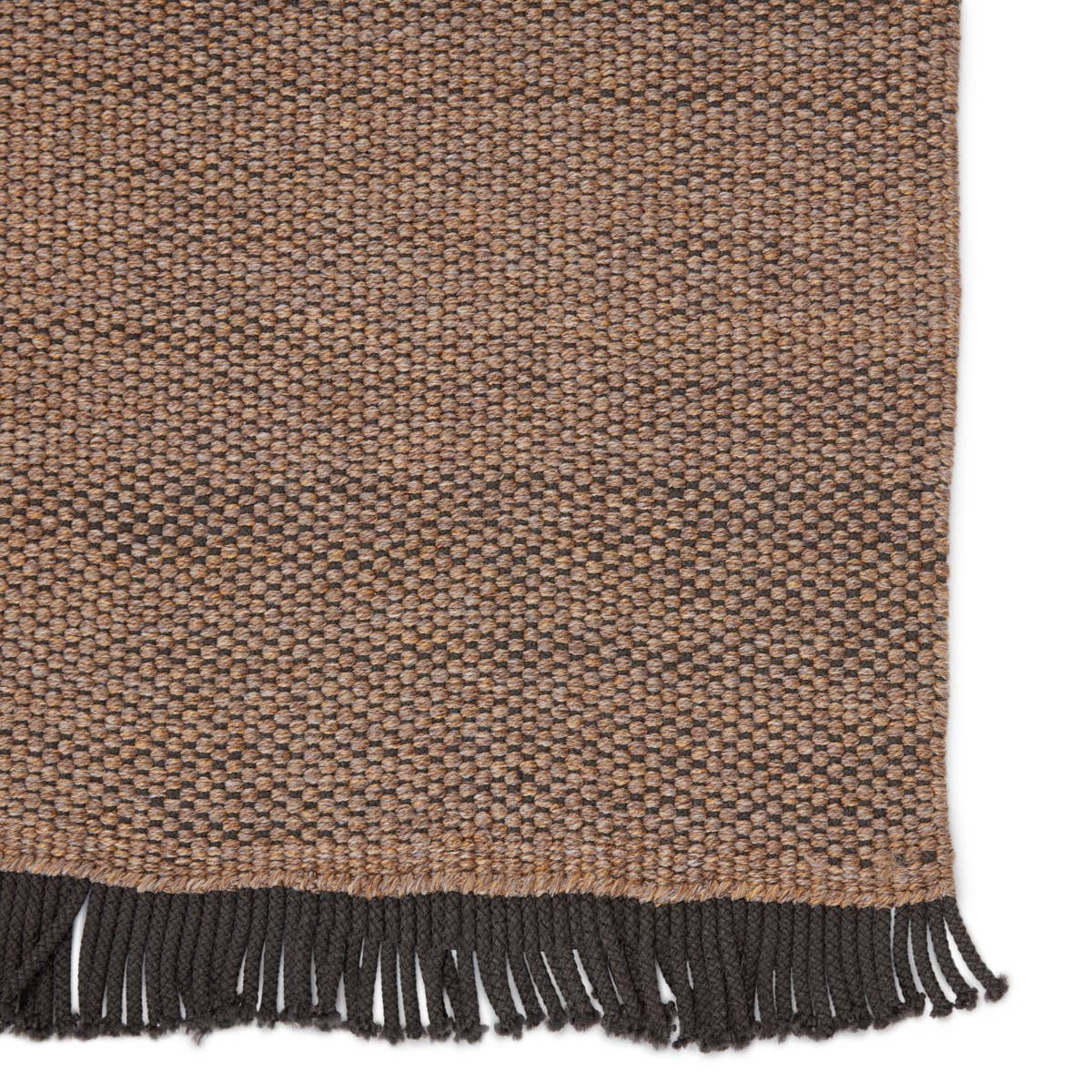 The Jaipur living Sonder Savvy Area Rug, or SOD01, offers a solid, basic design with natural-inspired texture that works for both indoor and outdoor spaces.  This rug features a durable, easy-to-clean polypropylene construction with distinctive corded fringe trim for a textural twist.