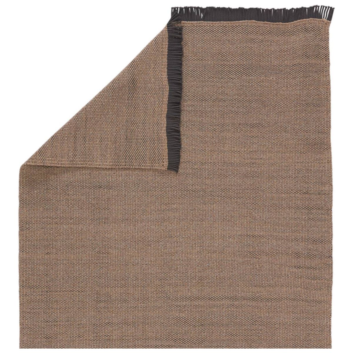 The Jaipur living Sonder Savvy Area Rug, or SOD01, offers a solid, basic design with natural-inspired texture that works for both indoor and outdoor spaces.  This rug features a durable, easy-to-clean polypropylene construction with distinctive corded fringe trim for a textural twist.