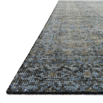 Hand-knotted in India of 100% wool, the Amara Blue/Gold Area Rug creates a casual yet refined vibe with high-end appeal. Showcase in your living room, bedroom, entryway, or other high traffic area.   Hand Knotted 100% Wool AMM-05 Blue/Gold