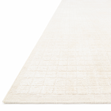Modern and refined, the Beverly Ivory rug from Loloi is hand-loomed by master artisans of viscose and wool pile. Clean lines and minimalist hues allow you to layer Beverly into any room.  Hand Loomed 72% Viscose | 28% Wool BEV-01 Ivory