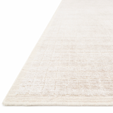 Modern and refined, the Beverly Natural rug by Loloi is hand-loomed by master artisans of viscose and wool pile. Clean lines and minimalist hues allow you to layer Beverly into any room.  Hand Loomed 68% Viscose | 32% Wool BEV-01 Natural