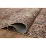 Featuring Billie Amber Lewis x Loloi Aqua / Rust Rug by Loloi at Amethyst Home. Touting richly saturated colors and a distressed pattern, the Billie Collection captures the look of a well-worn antique rug at a remarkable value. Reminiscent of one-of-a-kind rugs, this Amber Lewis x Loloi collection features random variations in color that render no two pieces .  Amethyst Home provides interior design, new home construction design consulting, vintage area rugs, and lighting in the Dallas metro area.