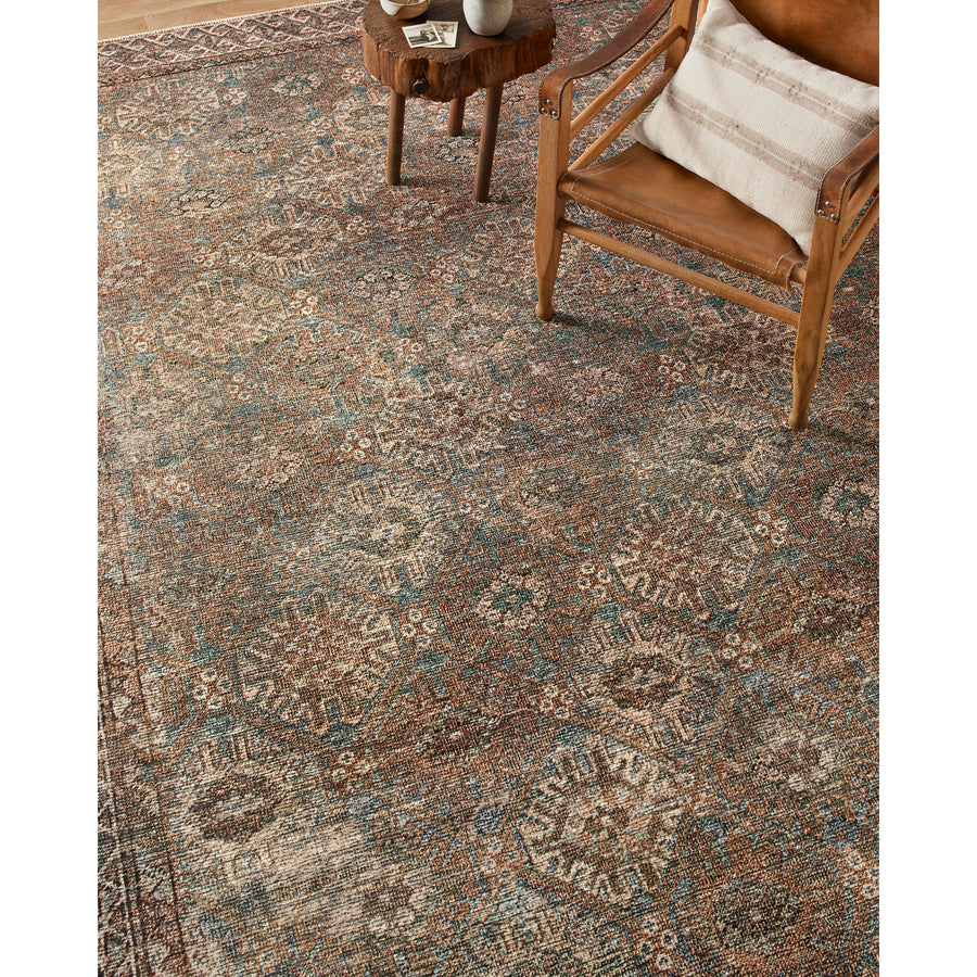 Touting richly saturated colors and a distressed pattern, the Billie Collection captures the look of a well-worn antique rug at a remarkable value. Reminiscent of one-of-a-kind rugs, this Amber Lewis x Loloi collection features random variations in color that render no two pieces exactly alike, creating up to 30% variance in color. BIL-04 AL Aqua / Rust