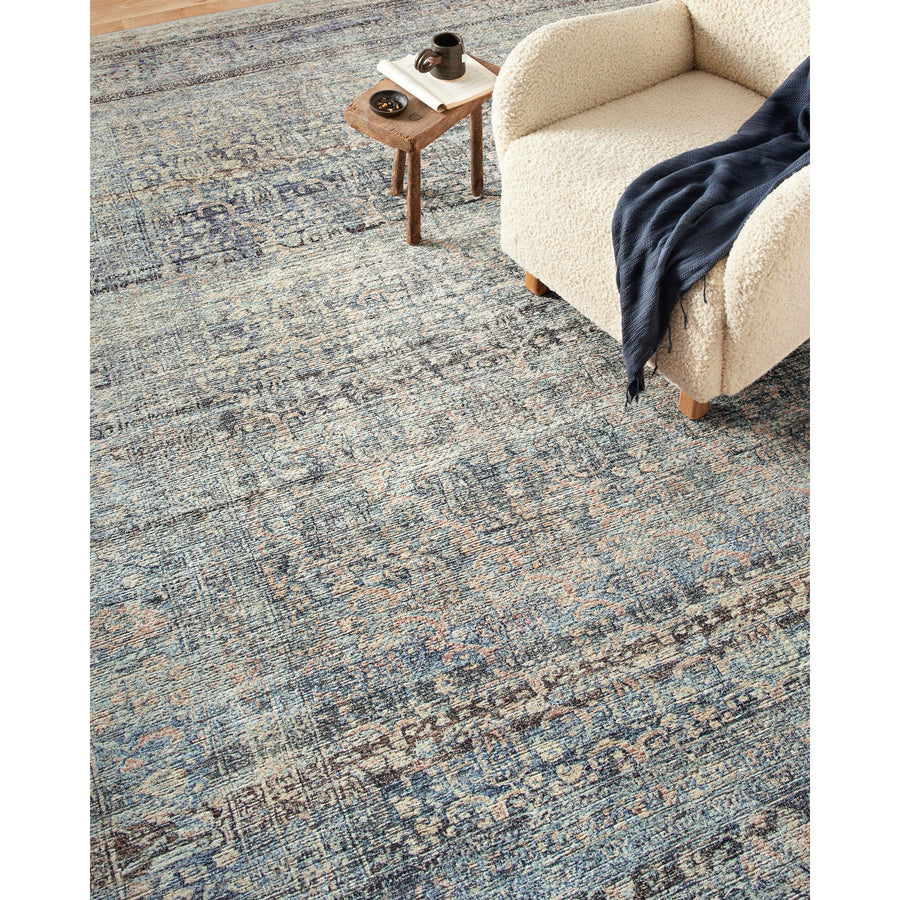 Touting richly saturated colors and a distressed pattern, the Billie Collection captures the look of a well-worn antique rug at a remarkable value. Reminiscent of one-of-a-kind rugs, this Amber Lewis x Loloi collection features random variations in color that render no two pieces exactly alike, creating up to 30% variance in color.  BIL-05 AL Denim / Blush