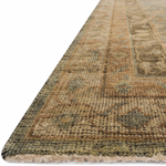 Bring a touch of antiqued beauty into your home with the Heirloom Aqua / Terracotta HQ-04 rug from Loloi. This wool rug tastefully honors the art of hand knotted rugs. This rug would be perfect for a living room, dining room, bedroom, hallway or kitchen runner with it's patterns and calming tones for your home.