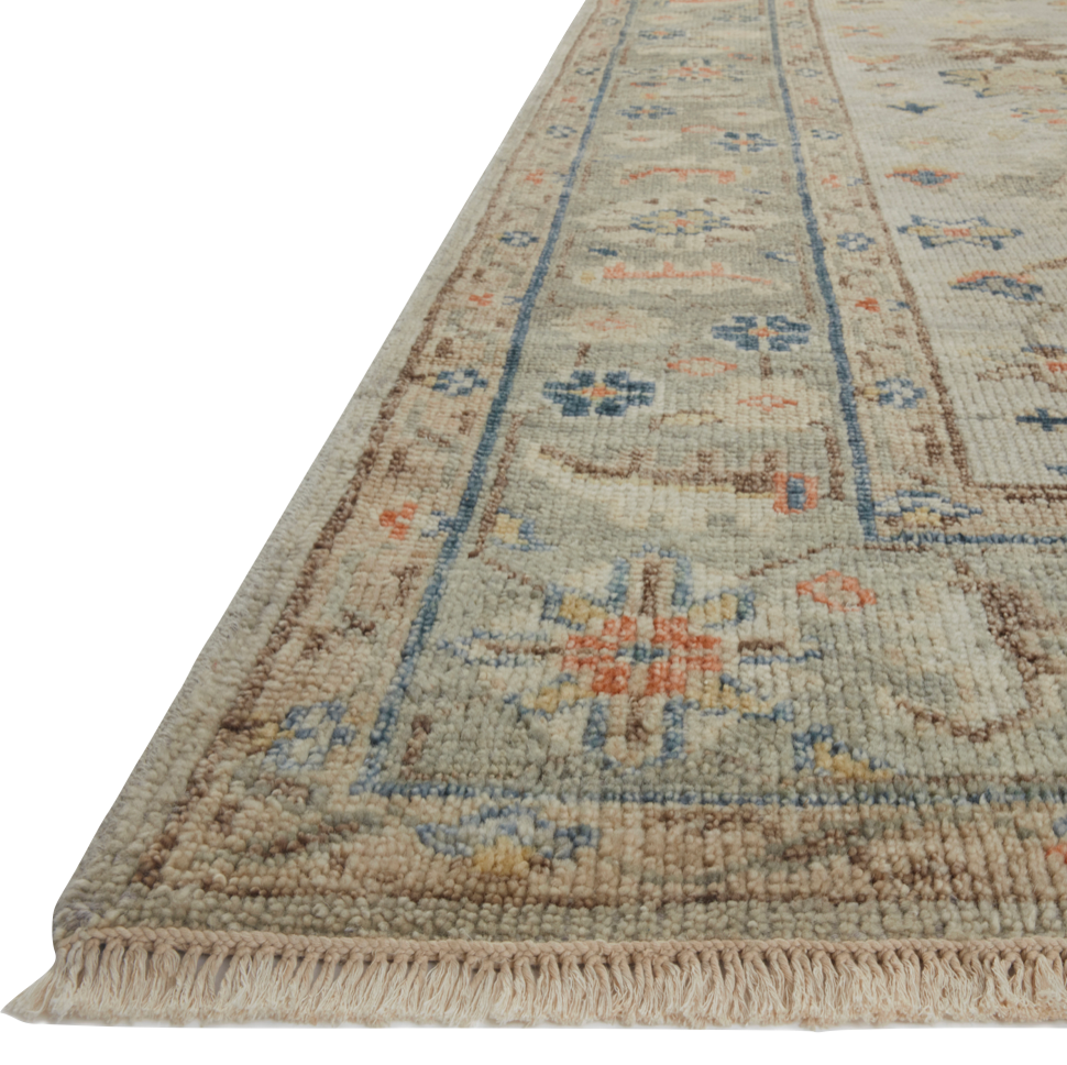 The Helena Stone / Multi HEL-09 area Rug from Loloi is hand-knotted of 100% wool, refined, yet versatile for any home. The Helena rug combines weathered tones and worldly patterns for a beautiful grounding element in any room.