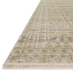 Both timeless and modern, the Idris area rug collection from Loloi is meticulously hand-knotted of viscose and wool. The tonal series features an elevated texture, accentuating the pattern in every piece.  Hand-Knotted 70% Viscose | 30% Wool ID-02 Beige/Straw