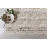 The Idris Granite/Sand area rug from Loloi is meticulously hand-knotted of viscose and wool. You will love this rug because the rug is:  Perfect for entryways, living rooms, and bedrooms Easy to clean and maintain Gorgeous with the intricate pattern and patina Warms up any room with the high / low pile Hand-Knotted 70% Viscose | 30% Wool ID-01 Granite/Sand