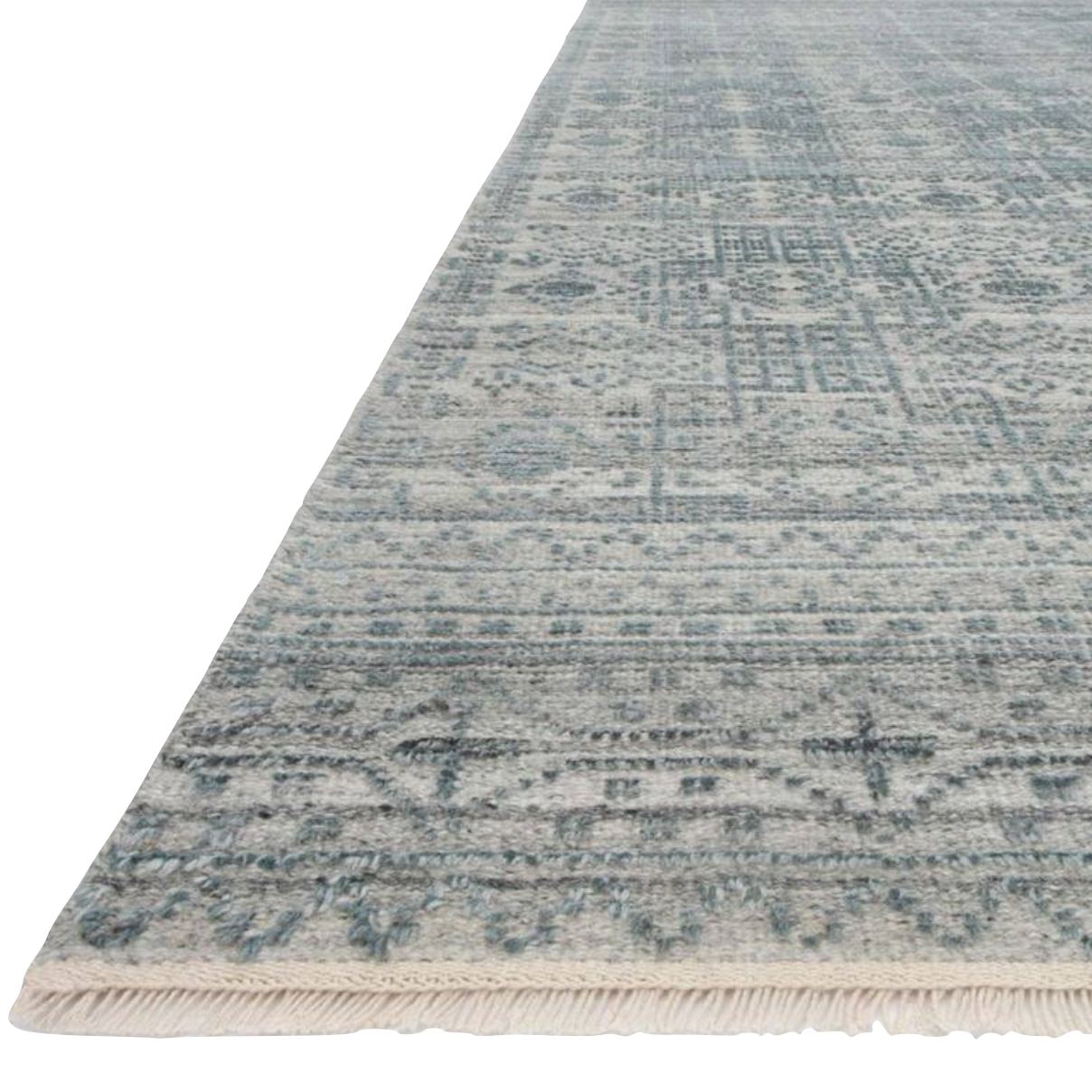 The Idris Spa area rug from Loloi is meticulously hand-knotted of viscose and wool. You will love this rug because the rug is:  Perfect for entryways, living rooms, and bedrooms Easy to clean and maintain Gorgeous with the intricate pattern and patina Warms up any room with the high / low pile Hand-Knotted 70% Viscose | 30% Wool ID-03 Spa