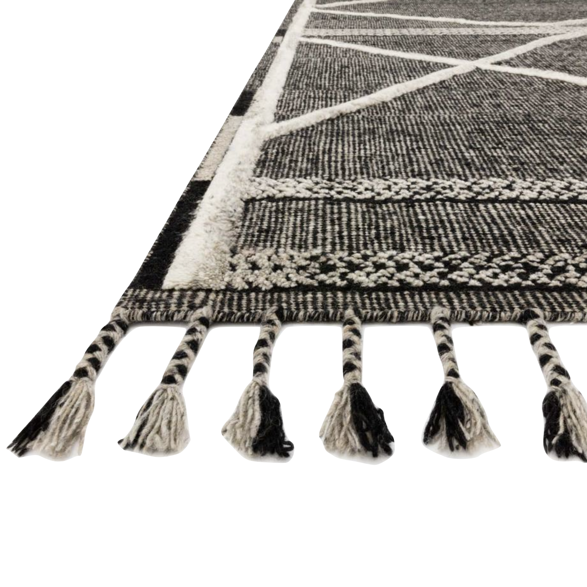 A new take on Moroccan style rugs, the Iman Collection is hand-knotted of 100% wool pile by skilled artisans in India. The surface features linear and braided details, creating tonal variations that make each piece unique. Plus, each design is finished with playful fringe.  Hand Knotted 100% Wool Pile IMA-02 Beige / Charcoal