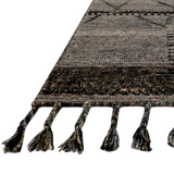 A new take on Moroccan style rugs, the Iman Collection is hand-knotted of 100% wool pile by skilled artisans in India. The surface features linear and braided details, creating tonal variations that make each piece unique. Plus, each design is finished with playful fringe.  Hand Knotted 100% Wool Pile IMA-04 Grey / Multi