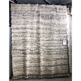 A nod to timeless Moroccan style, the Loloi Khalid Natural/Ivory Area Rug, or KF-05, is hand-knotted in India by skilled artisans. The soft pile features 100% natural, undyed wool, lending slight variations in tones that make each piece it's own. Plus, each rug is finished with a thoughtfully designed fringe.