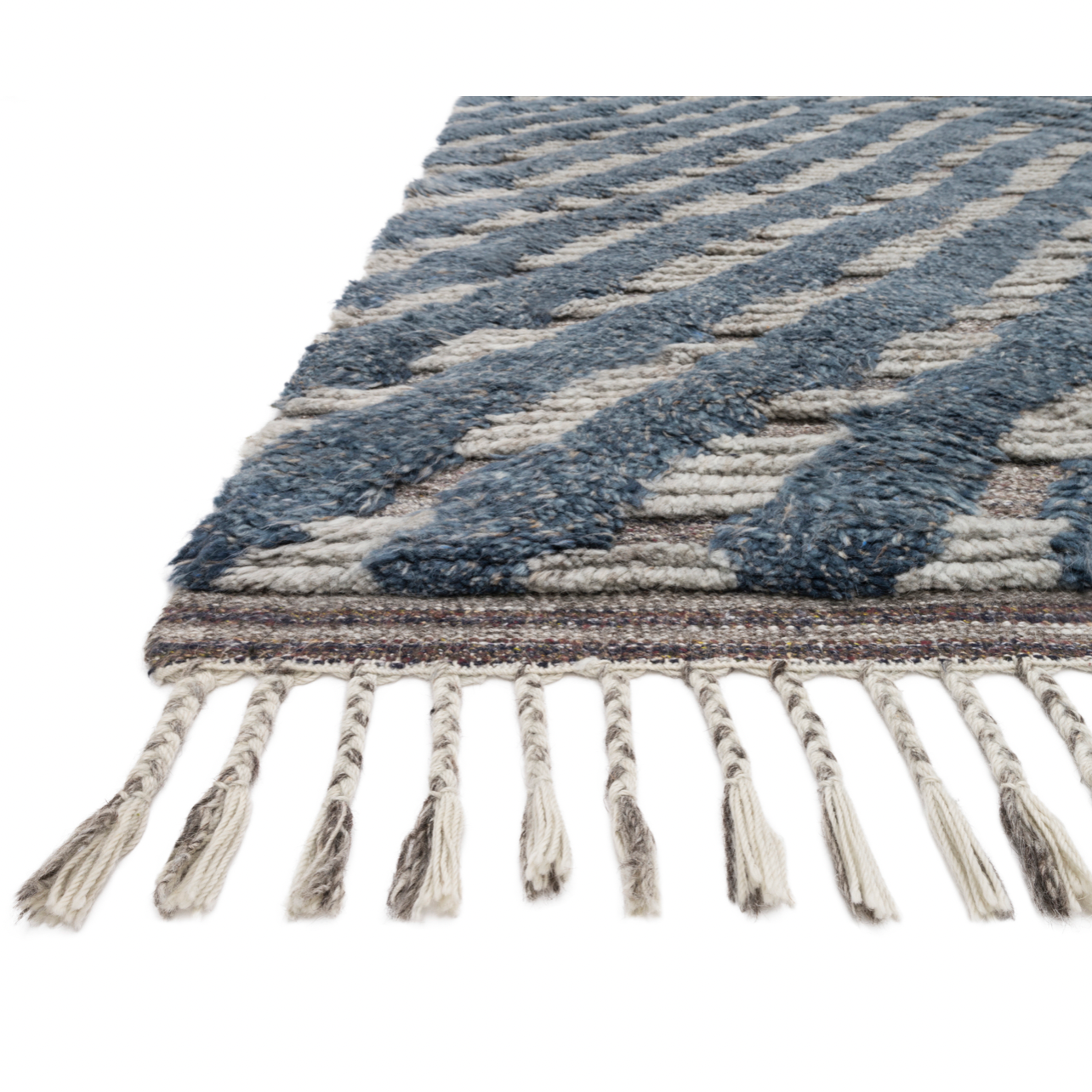 A nod to timeless Moroccan style, the Khalid Collection is hand-knotted in India by skilled artisans. The soft pile features 100% natural, undyed wool, lending slight variations in tones that make each piece it's own. Plus, each rug is finished with a thoughtfully designed fringe.  Hand Knotted 100% Wool KF-06 Blue/Pewter