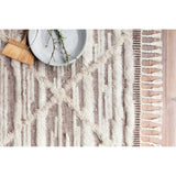 A nod to timeless Moroccan style, the Khalid Collection is hand-knotted in India by skilled artisans. The soft pile features 100% natural, undyed wool, lending slight variations in tones that make each piece it's own. Plus, each rug is finished with a thoughtfully designed fringe.  Hand-Knotted 100% Wool KF-07 Ivory/Taupe