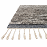 A nod to timeless Moroccan style, the Khalid Pewter/Ink Area rug is hand-knotted in India by skilled artisans. The soft pile features 100% natural, undyed wool, lending slight variations in tones that make each piece it's own. Plus, each rug is finished with a thoughtfully designed fringe.  Hand-Knotted 100% Wool KF-04 Pewter/Ink