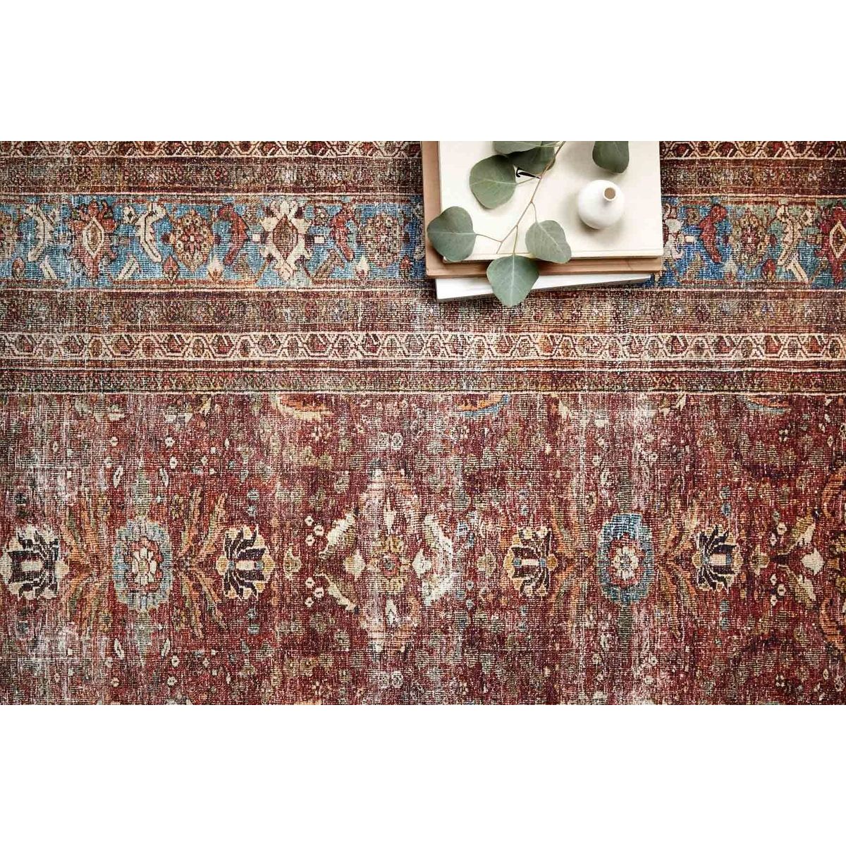 The Layla Collection is traditional and timeless, with a beautiful lived-in design that captures the spirit of an old-world rug. This traditional power-loomed rug is crafted of 100% polyester with a classic and sophisticated color palette and subtle patina.  Power Loomed 100% Polyester LAY-01 Brick/Blue