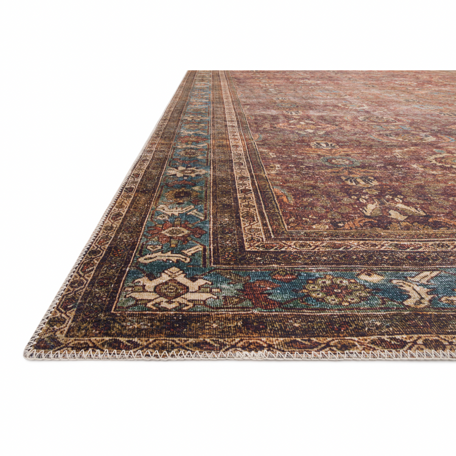 The Layla Collection is traditional and timeless, with a beautiful lived-in design that captures the spirit of an old-world rug. This traditional power-loomed rug is crafted of 100% polyester with a classic and sophisticated color palette and subtle patina.  Power Loomed 100% Polyester LAY-01 Brick/Blue