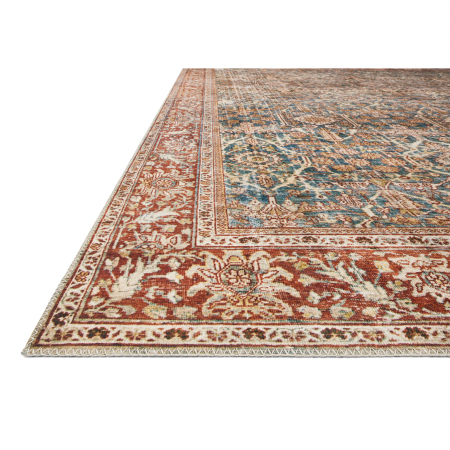 The Layla Collection is traditional and timeless, with a beautiful lived-in design that captures the spirit of an old-world rug. This traditional power-loomed rug is crafted of 100% polyester with a classic and sophisticated color palette and subtle patina.  Power Loomed 100% Polyester LAY-04 Ocean/Rust