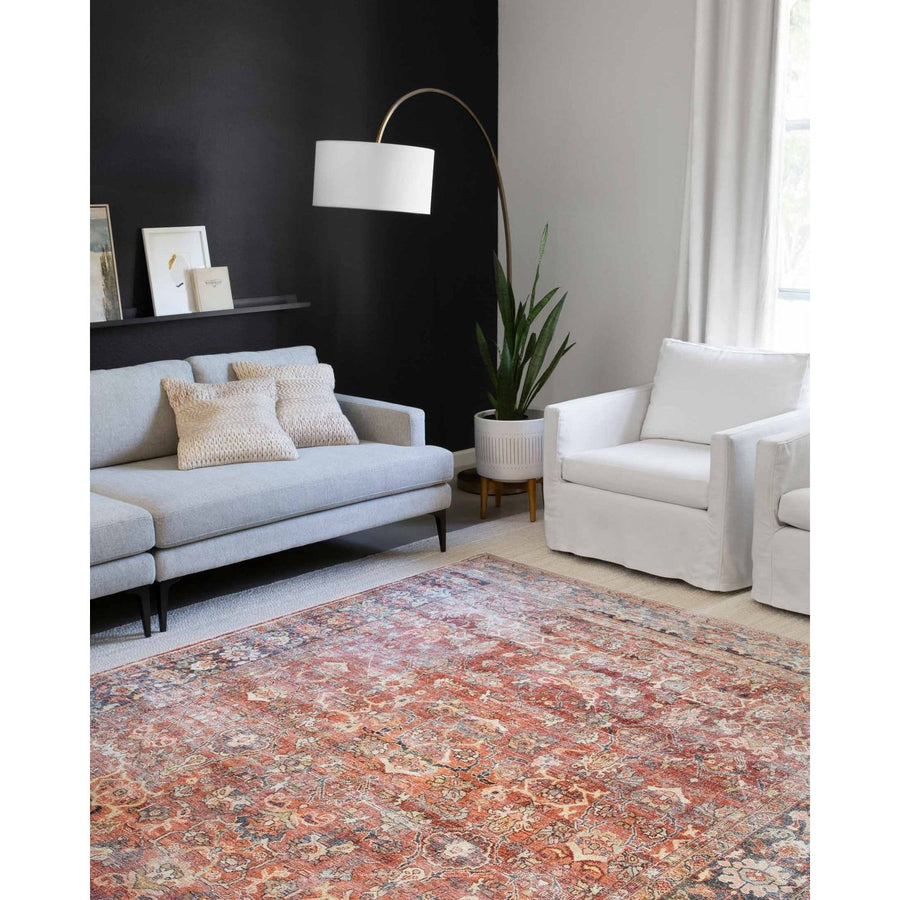 The Layla Collection is traditional and timeless, with a beautiful lived-in design that captures the spirit of an old-world rug. This traditional power-loomed rug is crafted of 100% polyester with a classic and sophisticated color palette and subtle patina.  Power Loomed 100% Polyester LAY-02 Spice/Marine